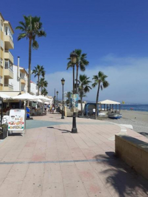 Beautiful Beachfront Newly Renovated 2 Bedroom Apartment with Swimming Pool and Garden